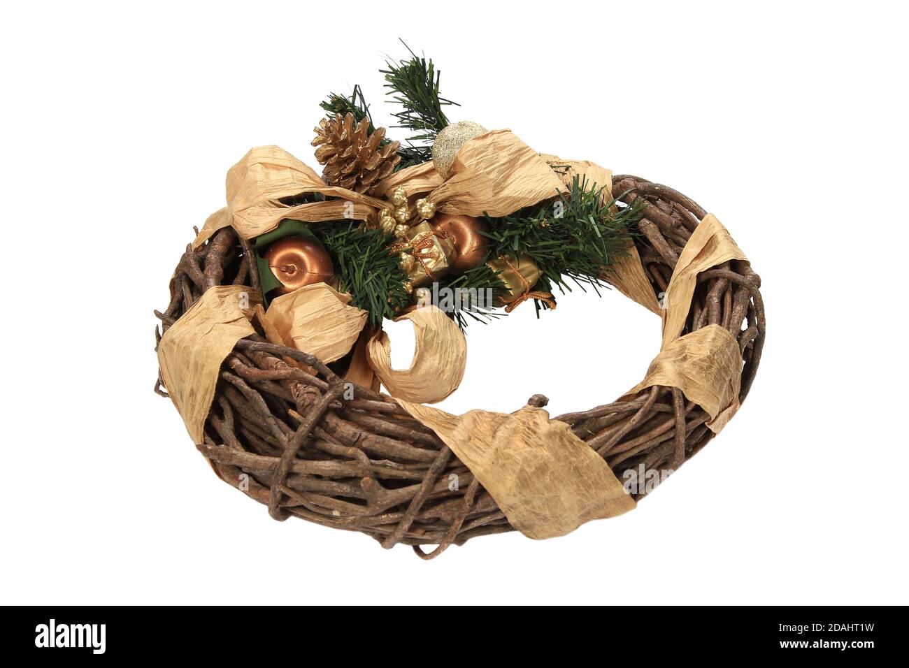 Closeup of a beautifully decorated wreath with pine cones and ribbon ...