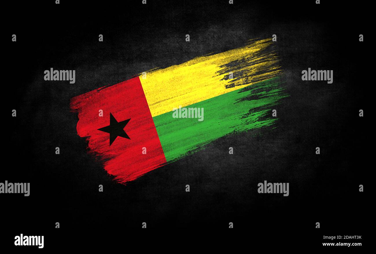 smear of paint in the form of the flag of Guinea Bissau close-up on a ...