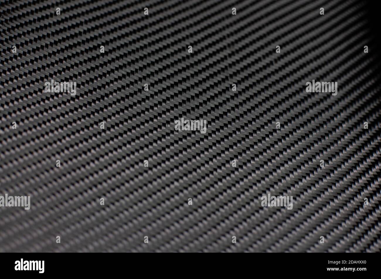 Real twill weaved carbon fiber flat texture Stock Photo