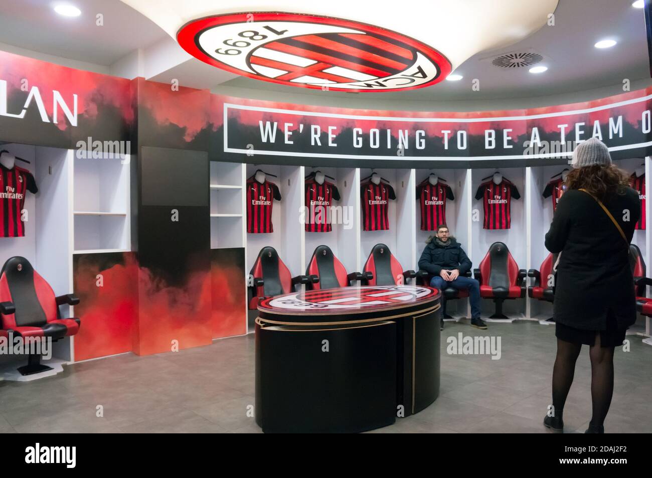 Tourists take pictures in the locker room for football players at the Giuseppe Meazza or San Siro stadium, built in 1925. Stock Photo