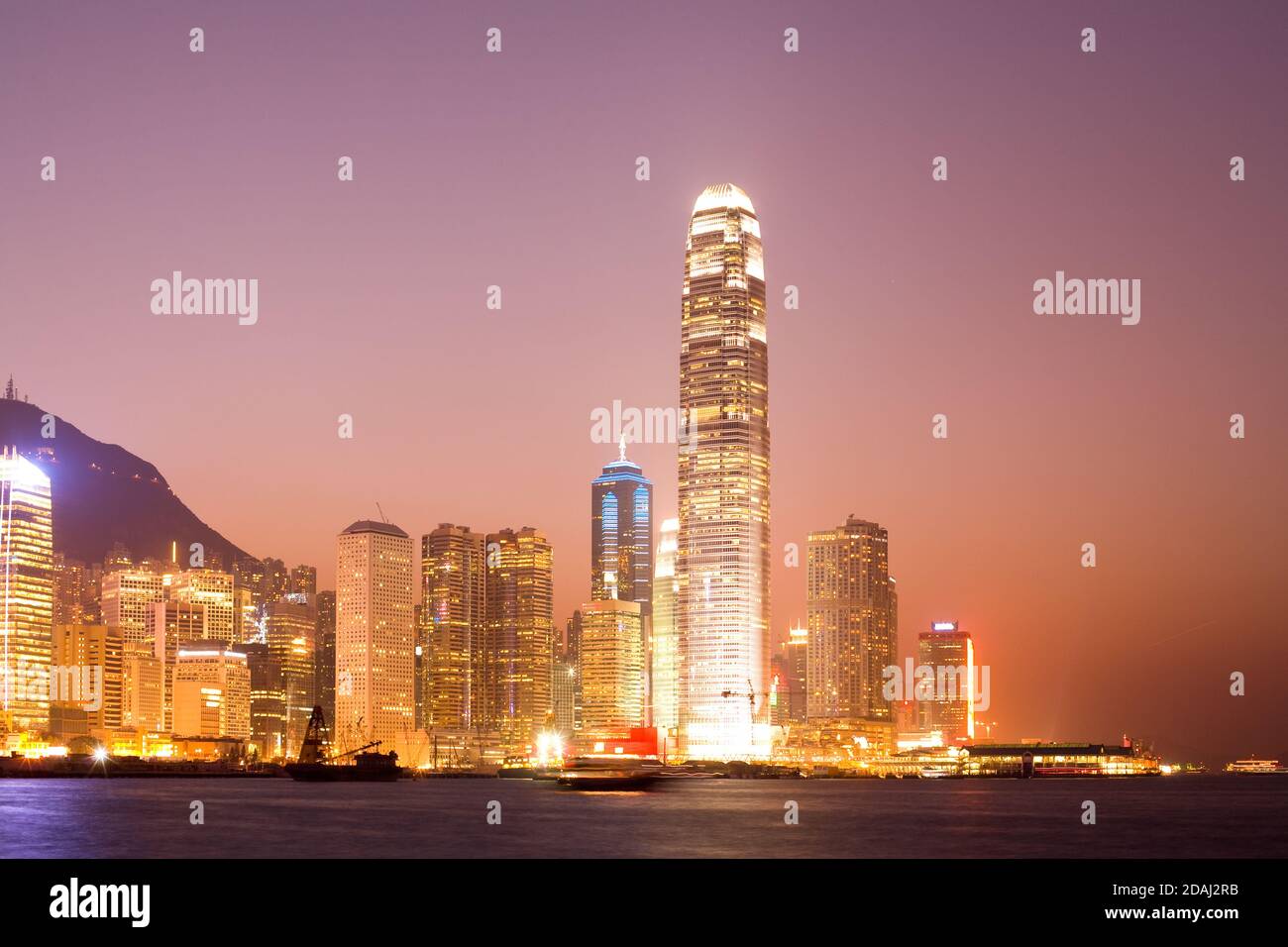 Skyline of Victoria Harbour on Hong Kong Island at dusk, Hong Kong, China, Asia Stock Photo