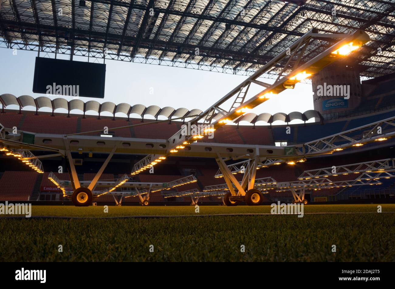 Artificial MLR light for growing sports natural lawn illuminates the grass at the stadium Giuseppe Meazza or San Siro, built in 1925. Stock Photo