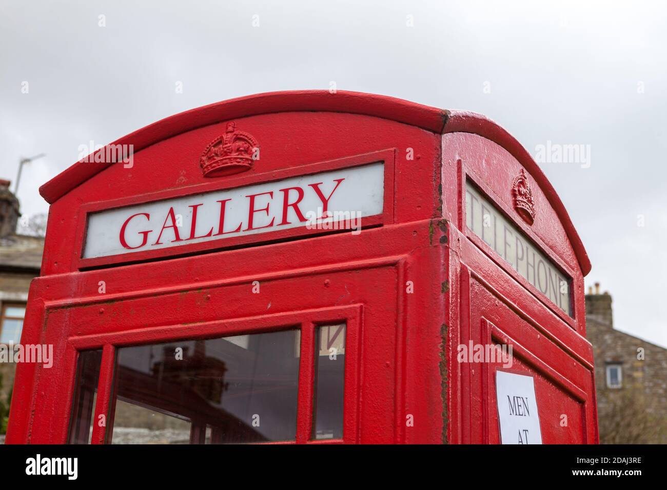 The Gallery on the Green in Settle, North Yorkshire - a red telephone box converted into an art gallery Stock Photo