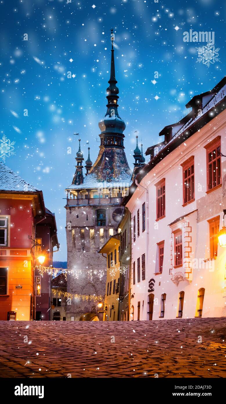 winter night in medieval town of Sighisoara Stock Photo