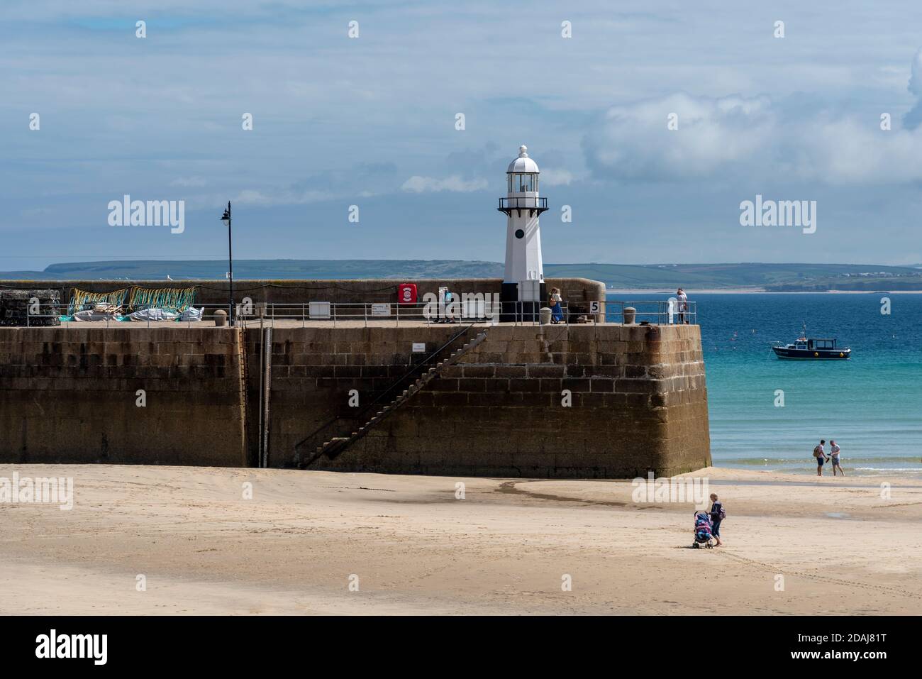Smeatons Pier Lighthouse, St Ives harbour at low tide, Cornwall, UK Stock Photo