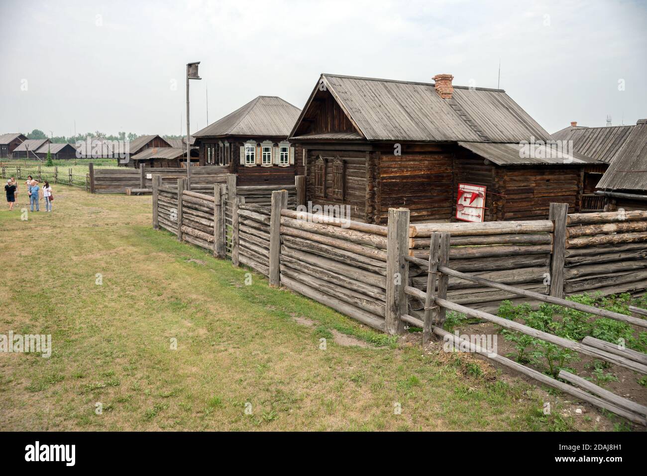 Village street in the exposition of the the historical and ethnographic open-air museum-reserve 'Shushenskoe', formerly the 'Siberian exile of Lenin'. Stock Photo