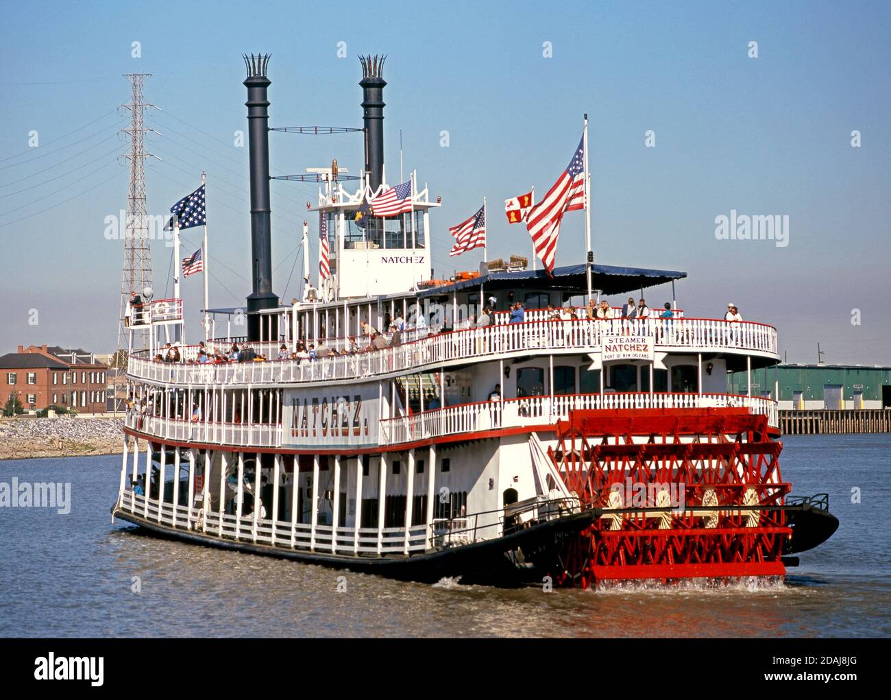 Tourists enjoying a trip on the steamboat ‘Natchez’ sailing along the