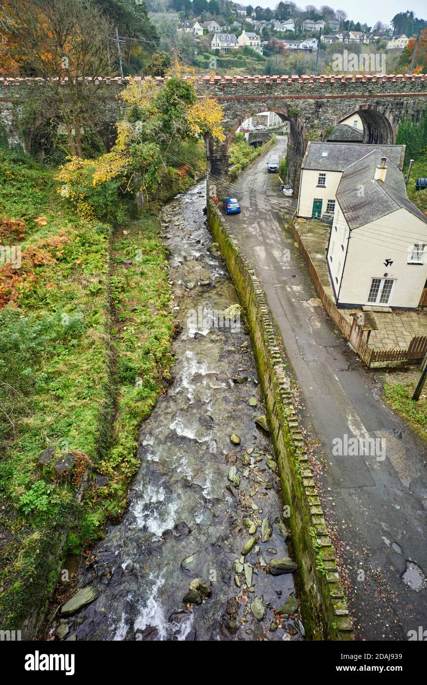 Looking down on the Laxey river with the electric train bridge in the background Stock Photo
