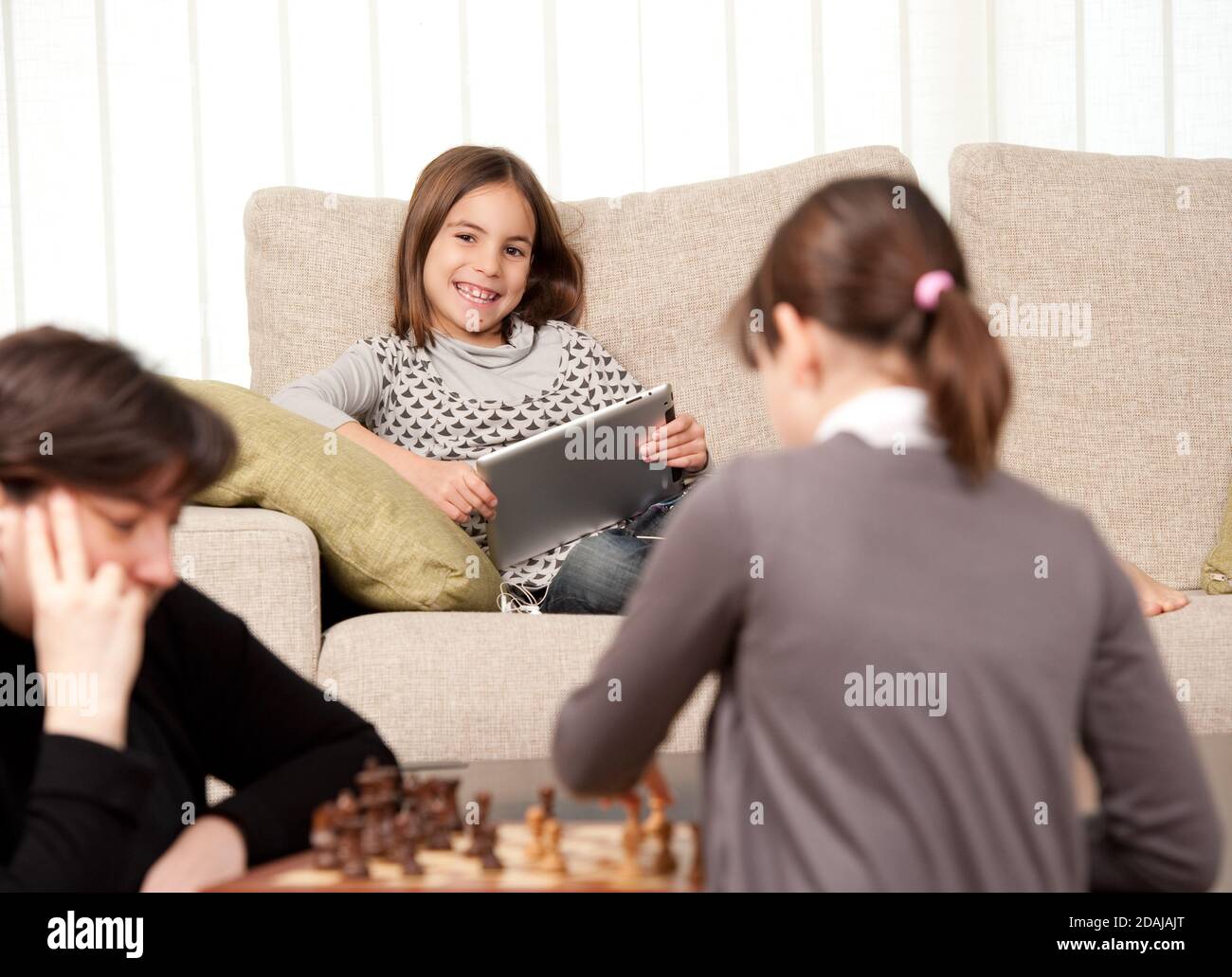 family playing chess Stock Photo