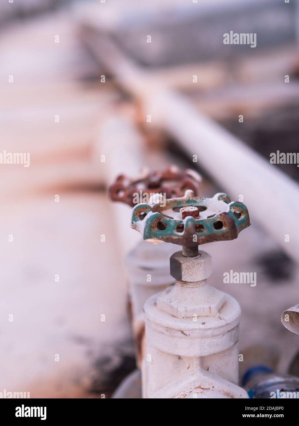 Damaged valves, pipes, and plumbing pipes, and lots of rusting, causing