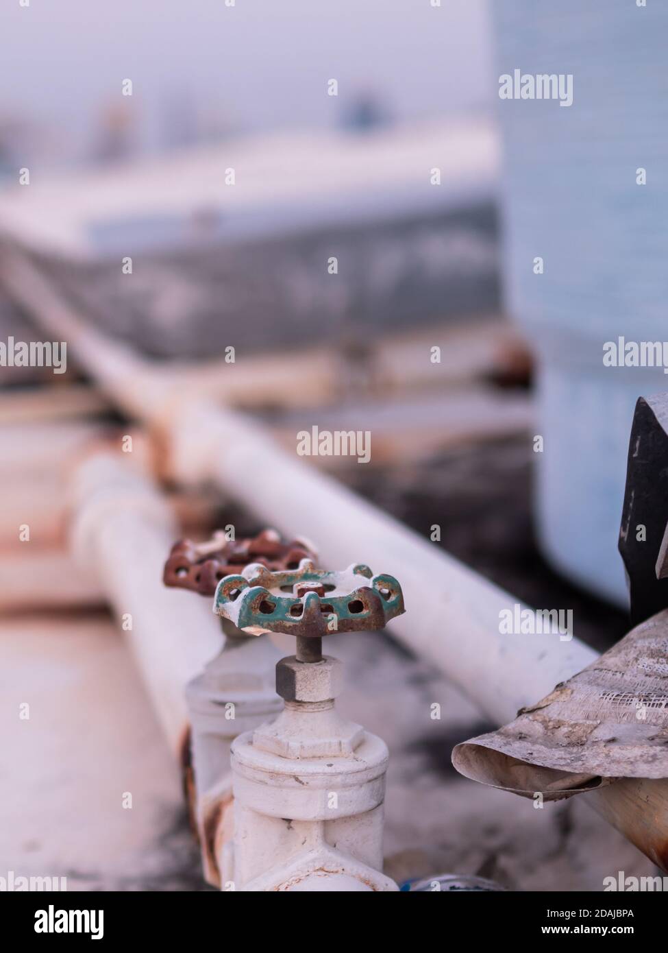 Damaged valves, pipes, and plumbing pipes, and lots of rusting, causing ...