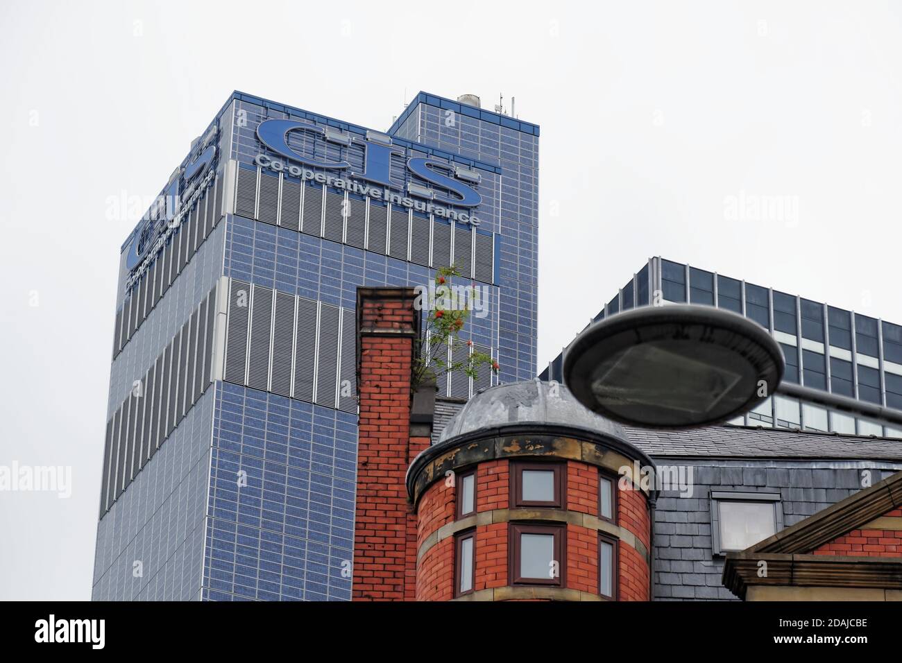 The CIS Tower is an office block skyscaper building in Manchester, UK. Presently a university building. The service tower (left) is solar panel clad. Stock Photo