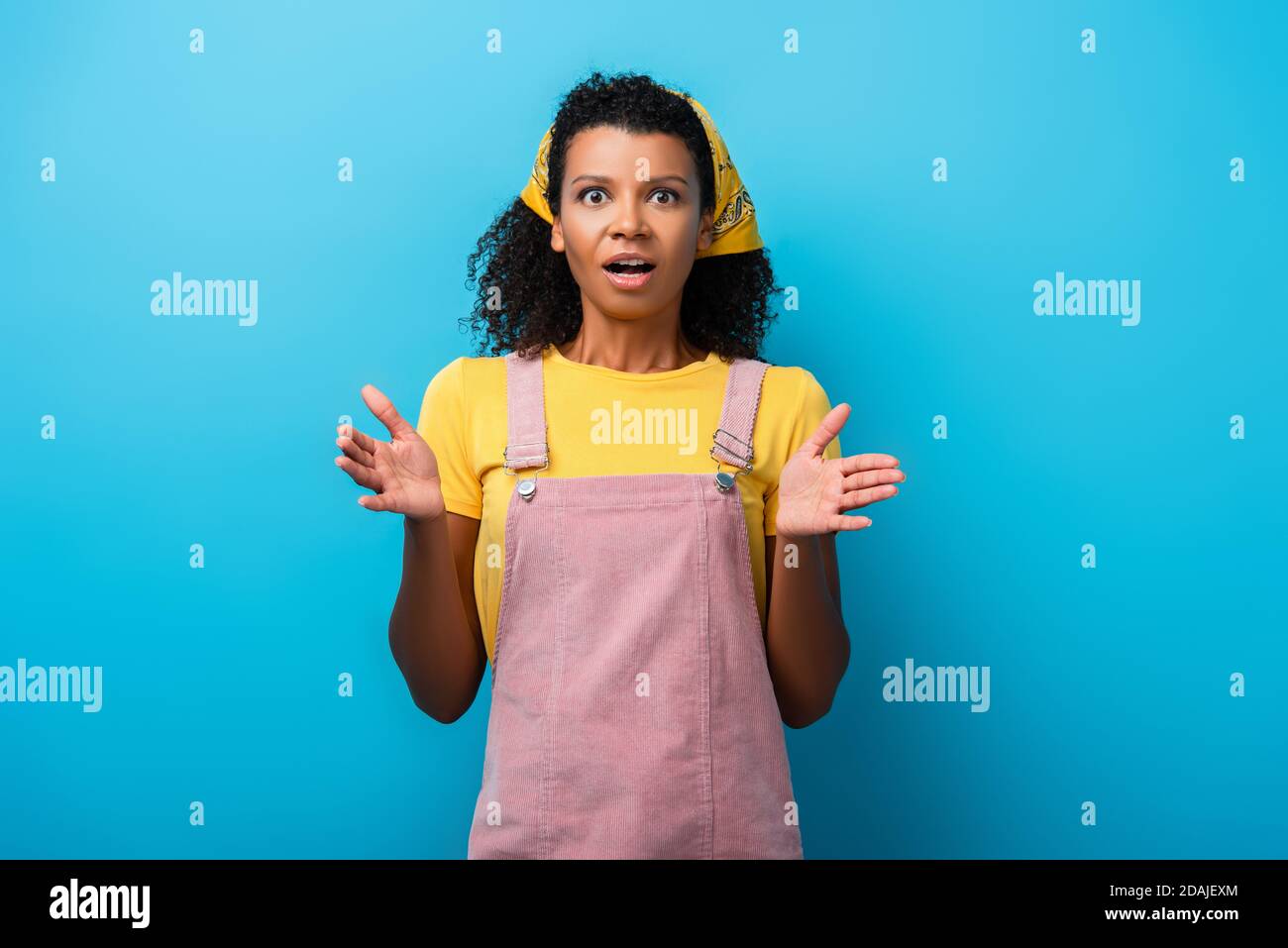 Look shocked woman curly hi-res stock photography and images - Alamy