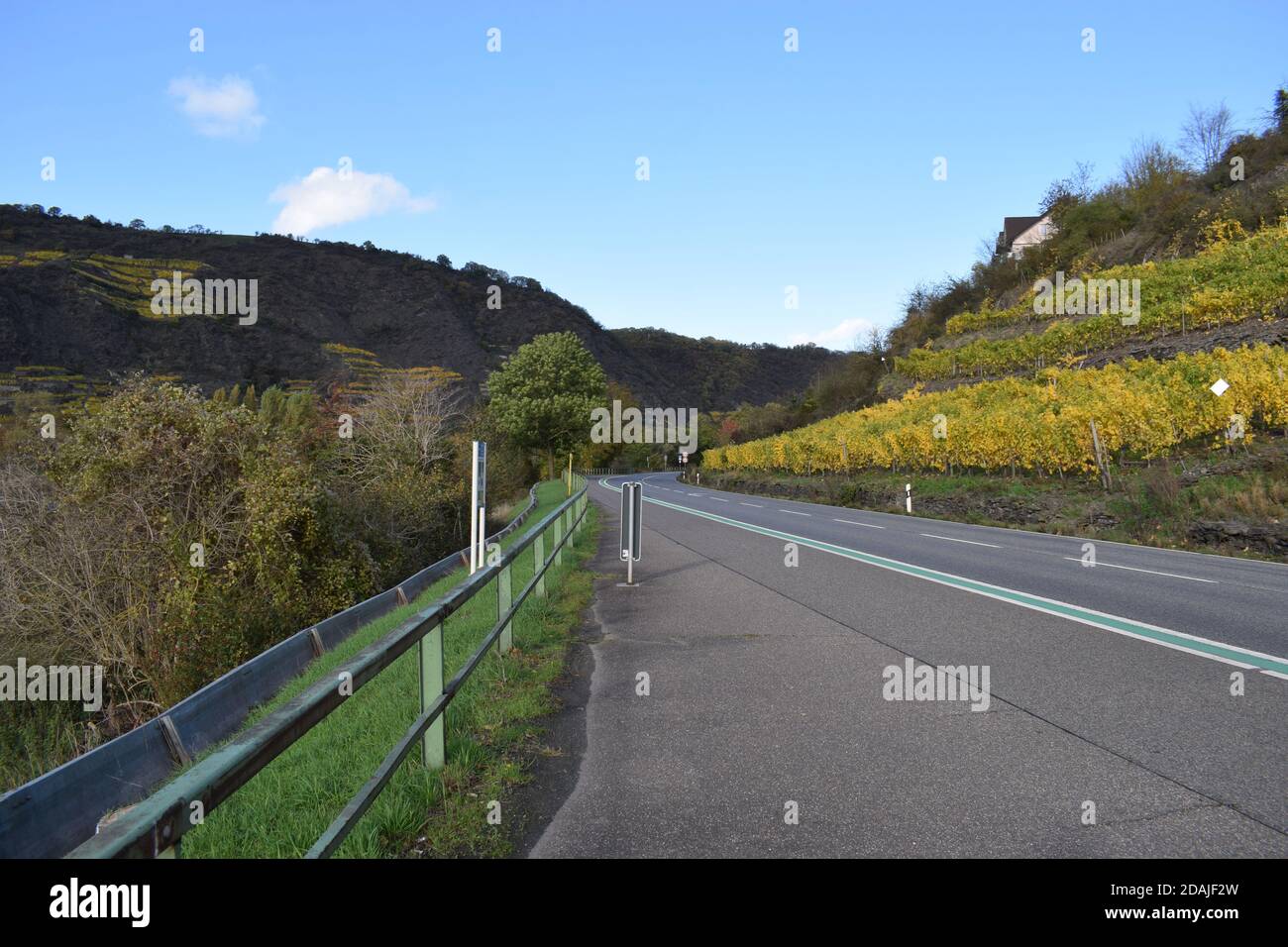 waterfront road in autumn colors Stock Photo Alamy