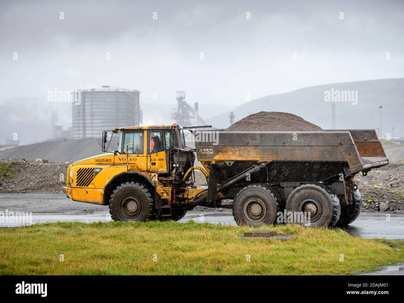 Dump truck moving coal at the Tata Steelworks in Port Talbot, South Wales Stock Photo