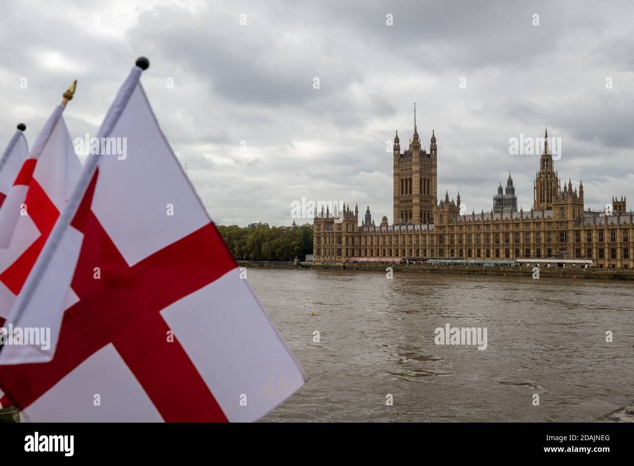 The House of Parliament with the flag of St. George in the foreground. Stock Photo