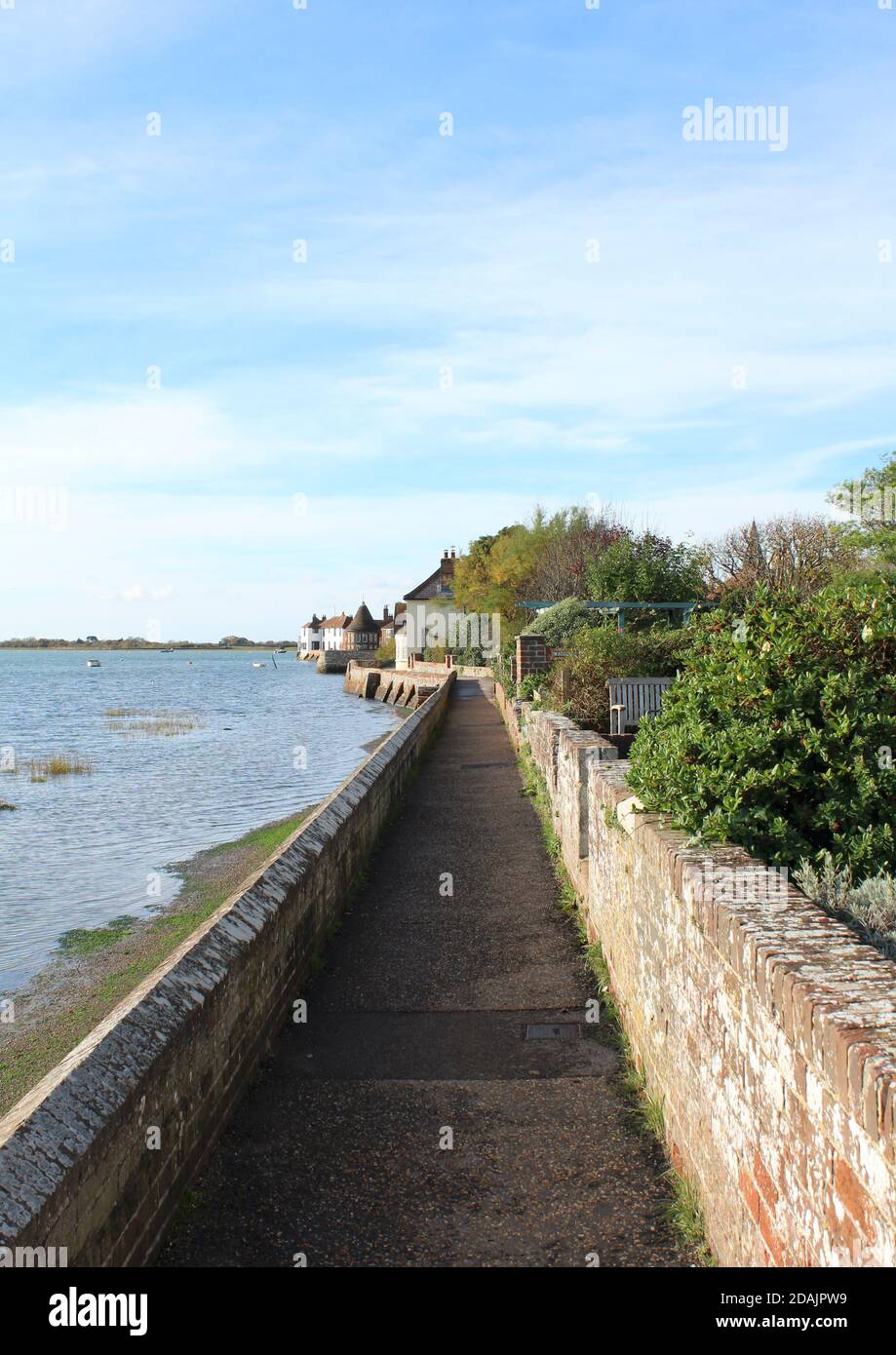 The trippet or footpath running alongside the harbour at Bosham, Chichester, West Sussex. Stock Photo
