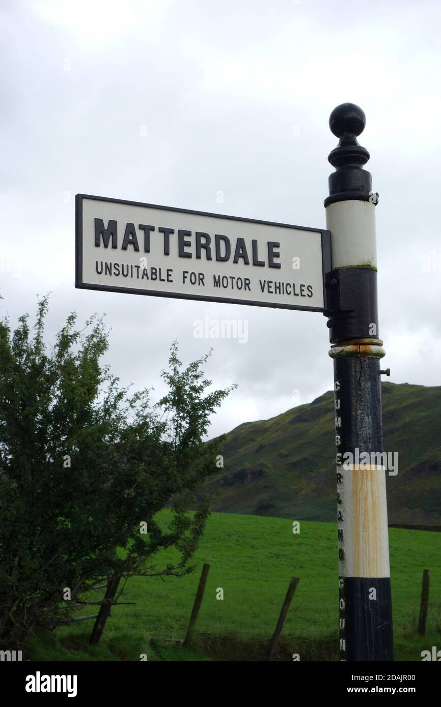 Metal Road Sign on B5322 for the Old Coach Road to Dockray in Matterdale via Hausewell Brow in the Lake District National Park, Cumbria, England, UK. Stock Photo