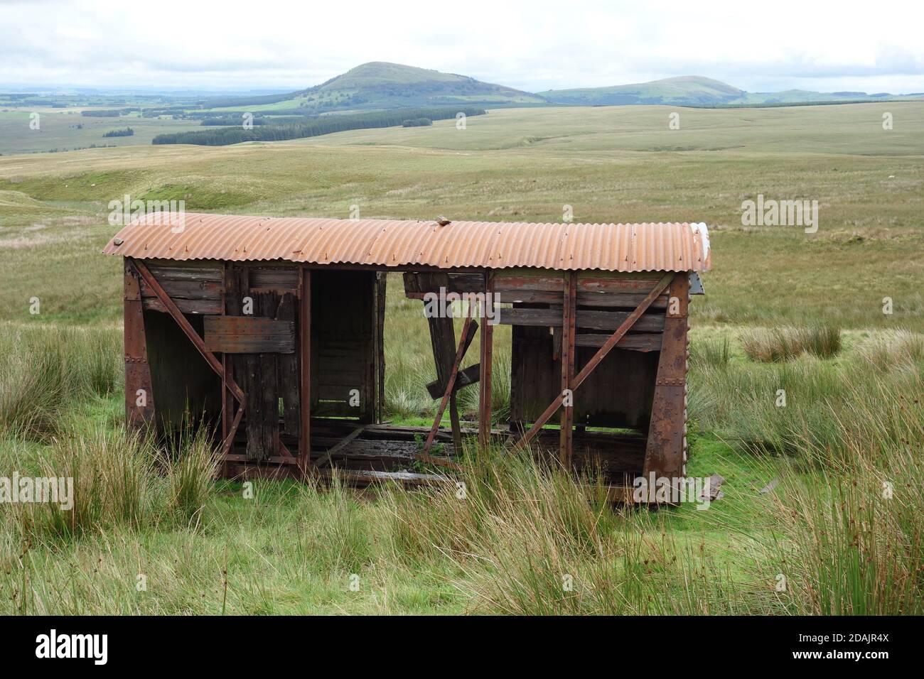 Railway Carriage by the Old Coach Road to Matterdale at Hausewell Brow with the Wainwrights 'Great & Little Mell Fell' Lake District National Park. Stock Photo