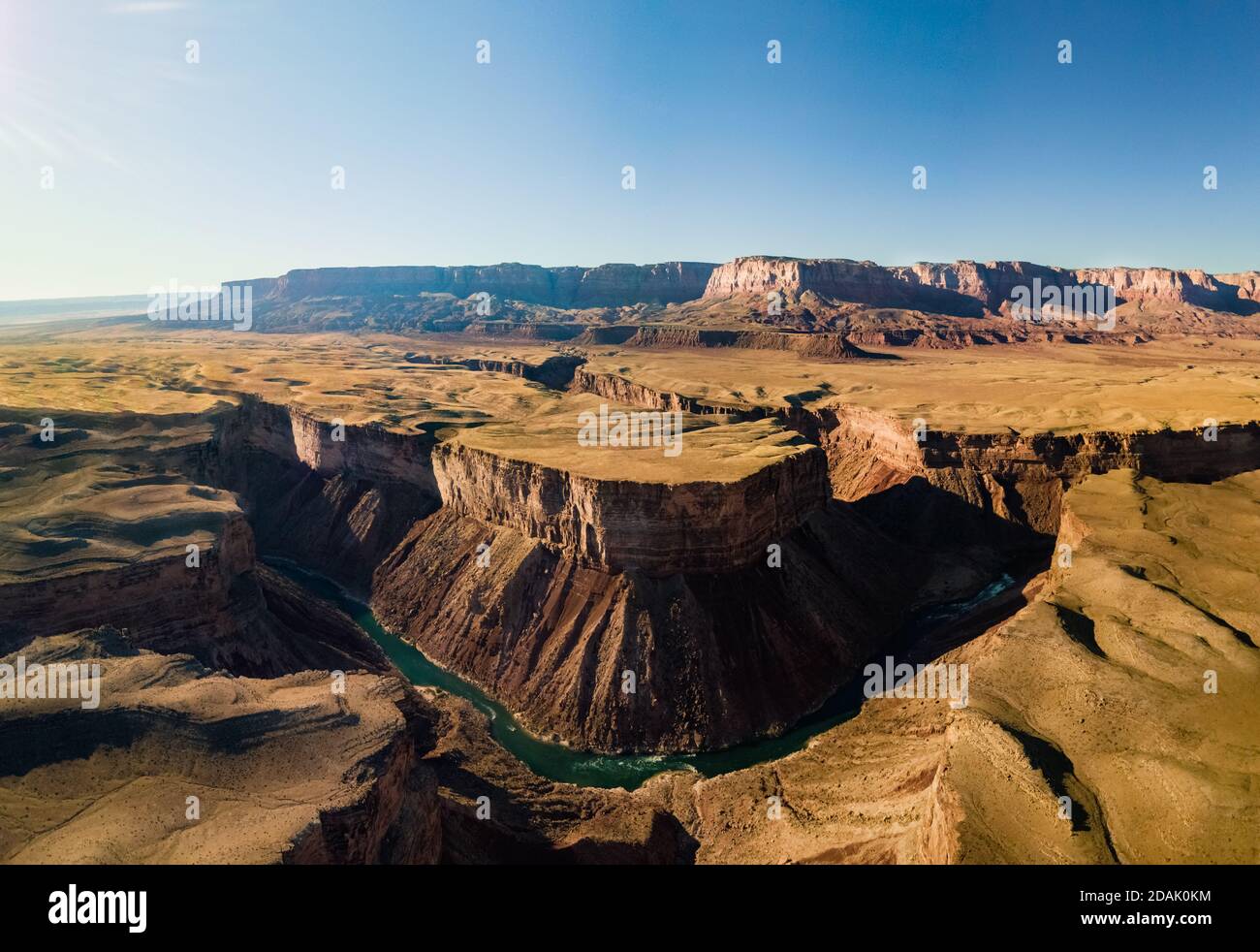 Panoramic drone view of an incised meander of the Colorado River next to the famous Horse Shoe Bend near the town of Page Arizona United States Stock Photo