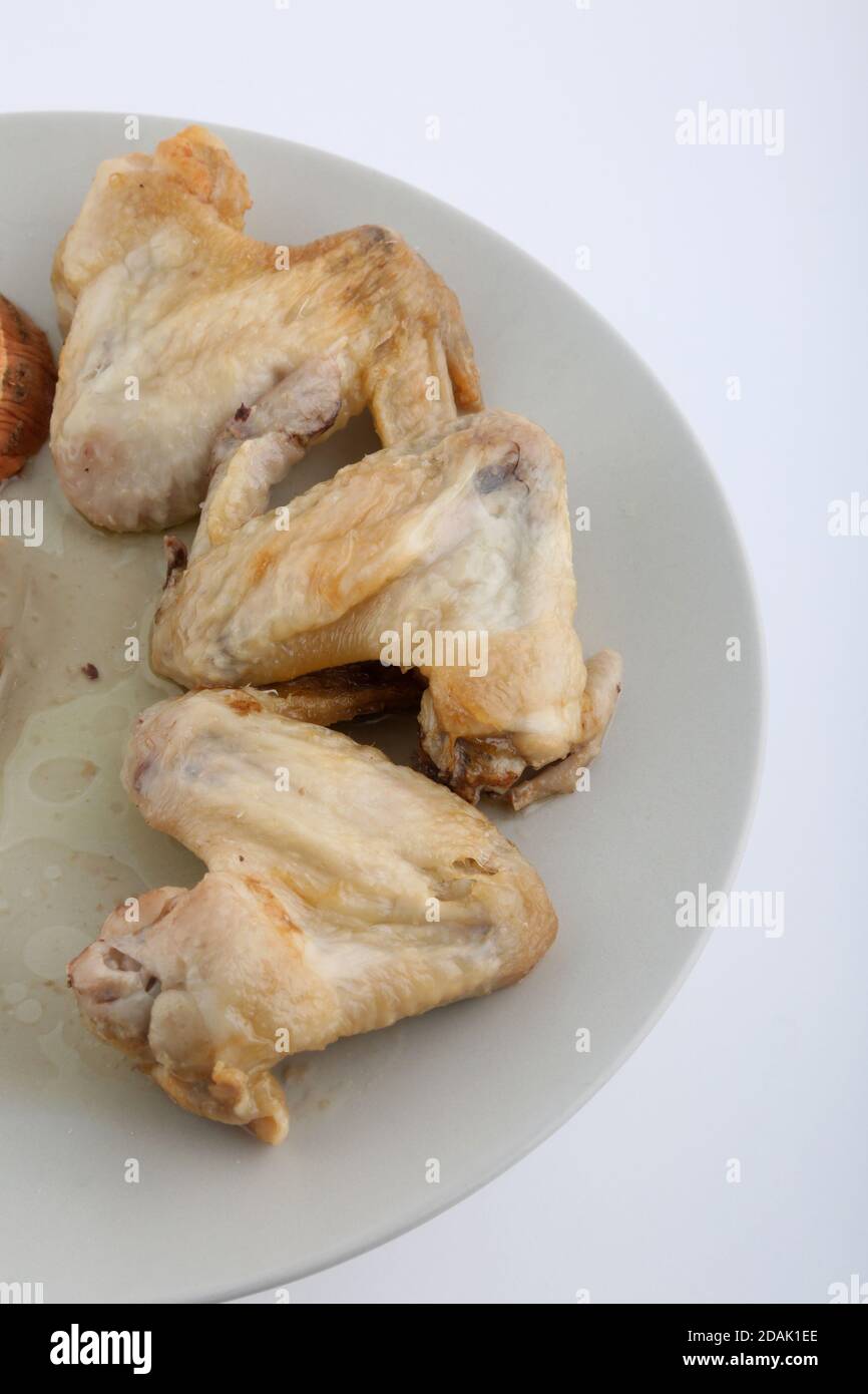 chicken wings with carrot side as ketogenic diet Stock Photo
