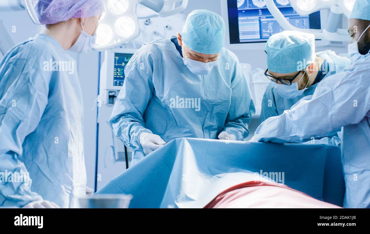 Operating Assistant Hospital Diverse Team of Professional surgeon, Assistants and Nurses Performing ...