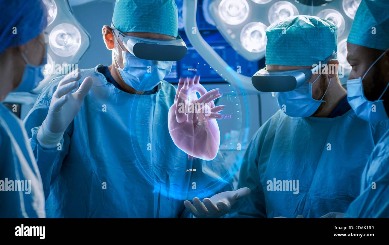 Surgeons Perform Heart Surgery Using Augmented Reality Technology. Difficult Heart Transplant Operation Using 3D Animation and Gestures. Interactive Stock Photo - Alamy Surgeons Perform Heart Surgery Using Augmented Reality Technology. Difficult Heart Transplant Operation Using 3D Animation and Gestures. Interactive Stock Photo - Alamy
