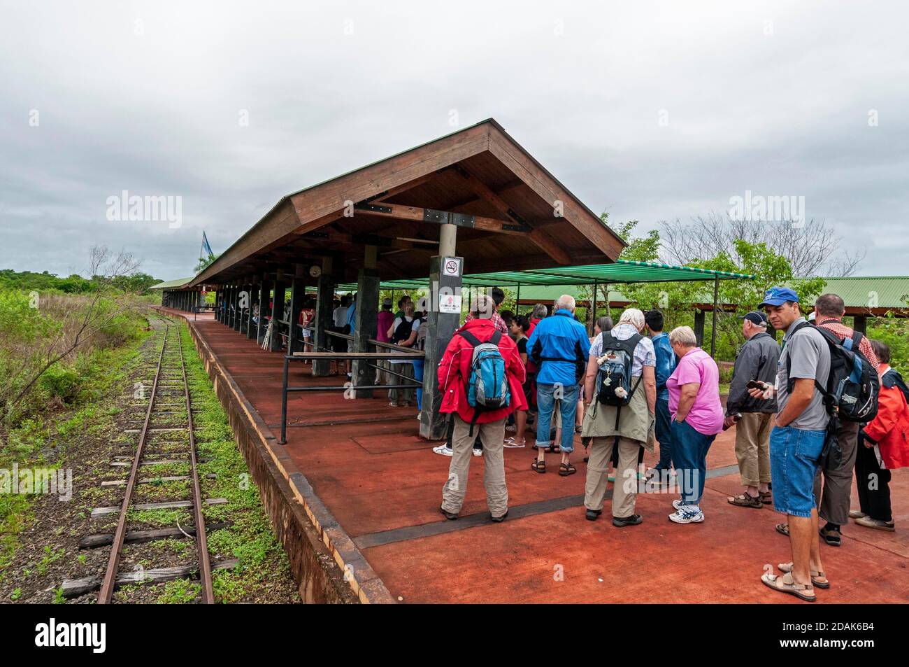 Visitors waiting for the Jungle train ( Rainforest Ecological Train) at the Central Station in the Iguazu Waterfalls in the Iguazu National Stock Photo