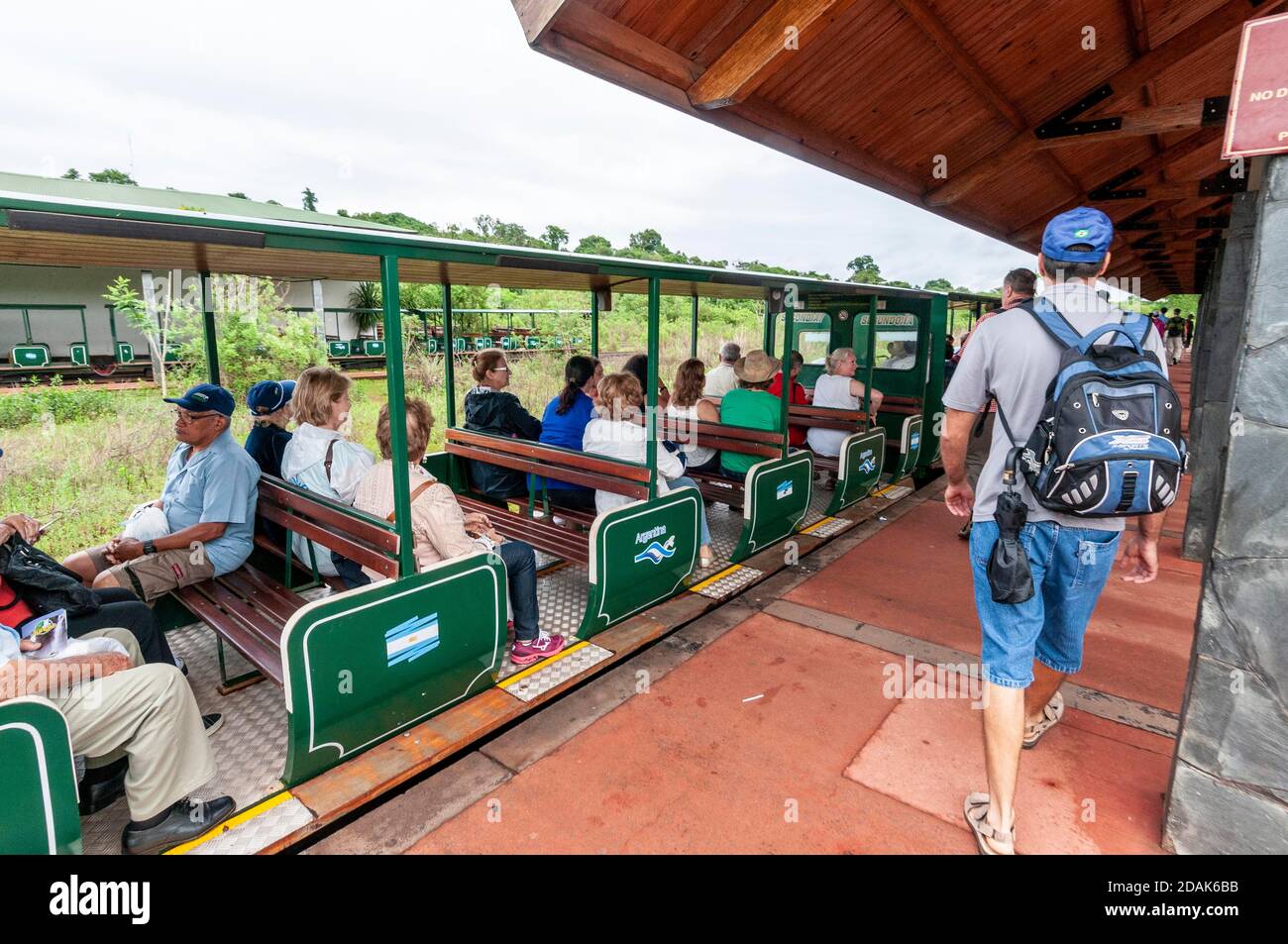 Visitors boarding a Jungle train ( Rainforest Ecological Train)  at the Central Station to Devils Throat Falls, part of the Iguazu Waterfalls in the I Stock Photo