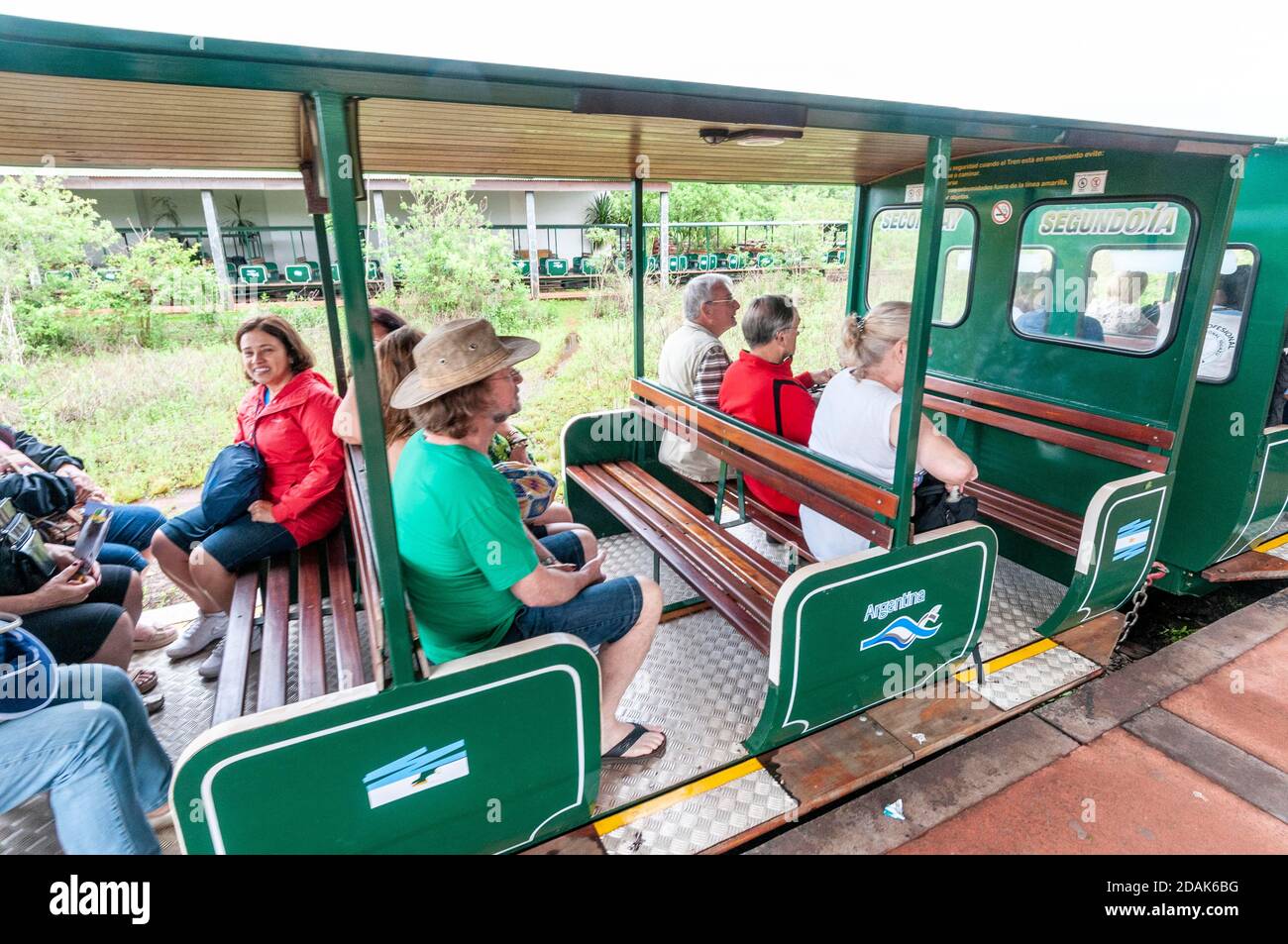 Visitors boarding a Jungle train ( Rainforest Ecological Train)  at the Central Station to Devils Throat Falls, part of the Iguazu Waterfalls in the I Stock Photo