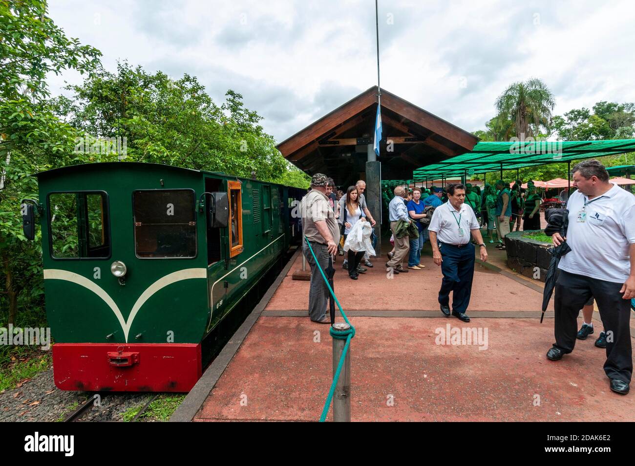 Visitors alight the Jungle train ( Rainforest Ecological Train)  at one of the two stations in the Iguazu Waterfalls within the Iguazu National Park o Stock Photo