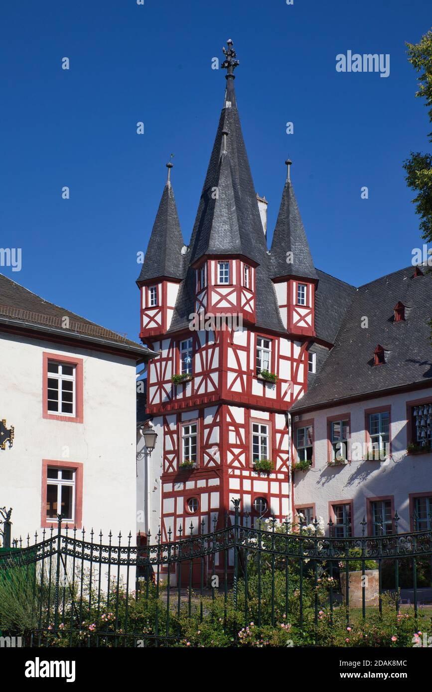 Very ornate decorated tower with pointed turrets on top on a large house in the town of Rudesheim, on the River Rhine, Darmstadt, Heese, Germany Stock Photo