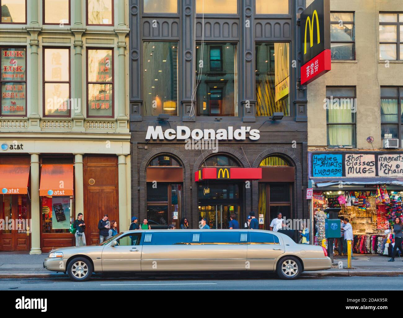 New York, New York State, United States of America.  Stretch limousine in front of Canal Street McDonald’s fast food restaurant. Stock Photo
