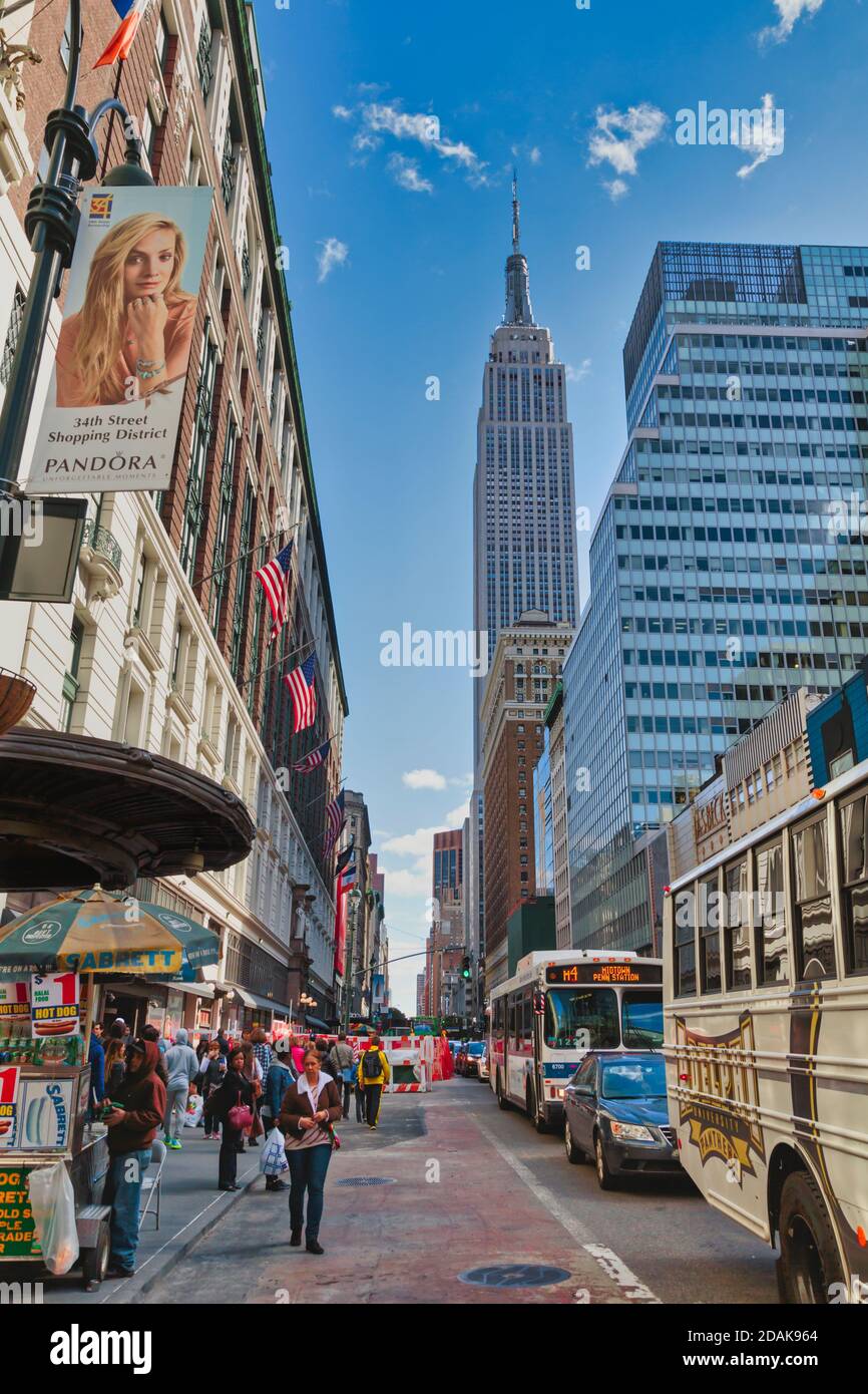 Empire State Building seen along West 34th Street, New York City, New York State, United States of America. Stock Photo