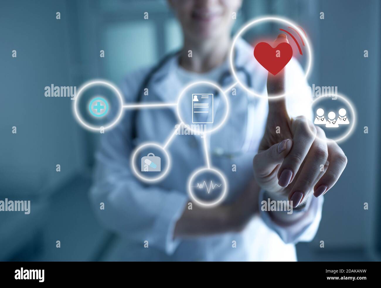 Cardiologist touch sensor panel with heart and cardio icons.MODERN TECHNOLOGY HEART TREATMENT Stock Photo