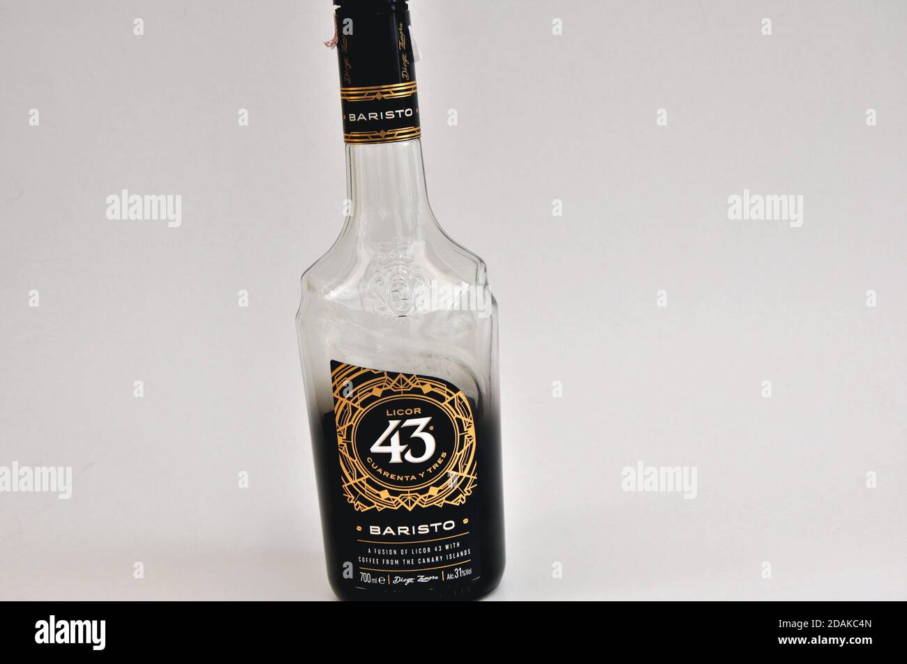 Liquor bottle, Spanish liqueur with alcohol content, in glass bottle, with guarantee seal, with coffee flavor, white background, copy space Stock Photo