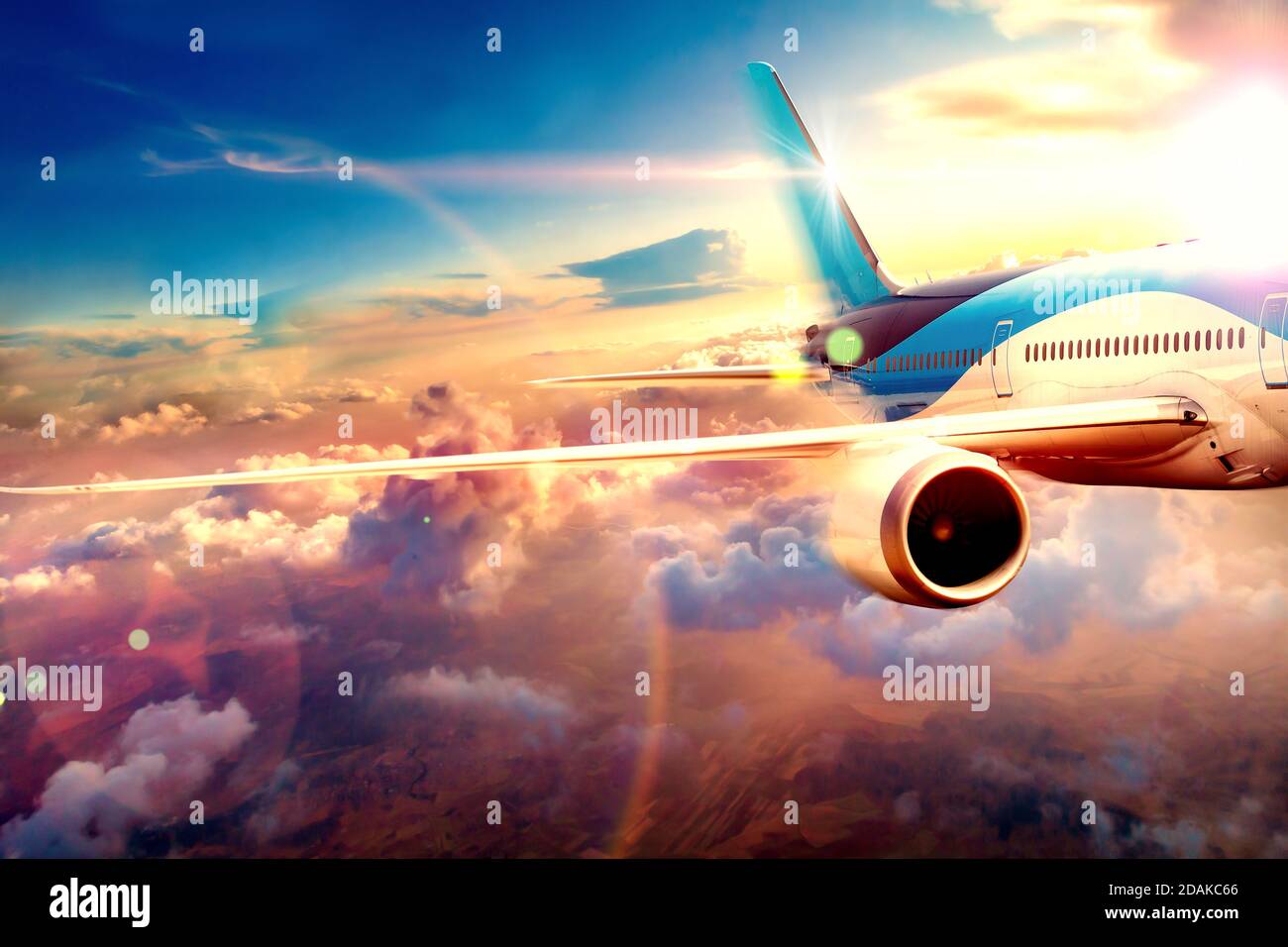 Aeroplane and scenic sunset.Vacations and tourism flying around the world. Concept of air travel and adventures background Stock Photo