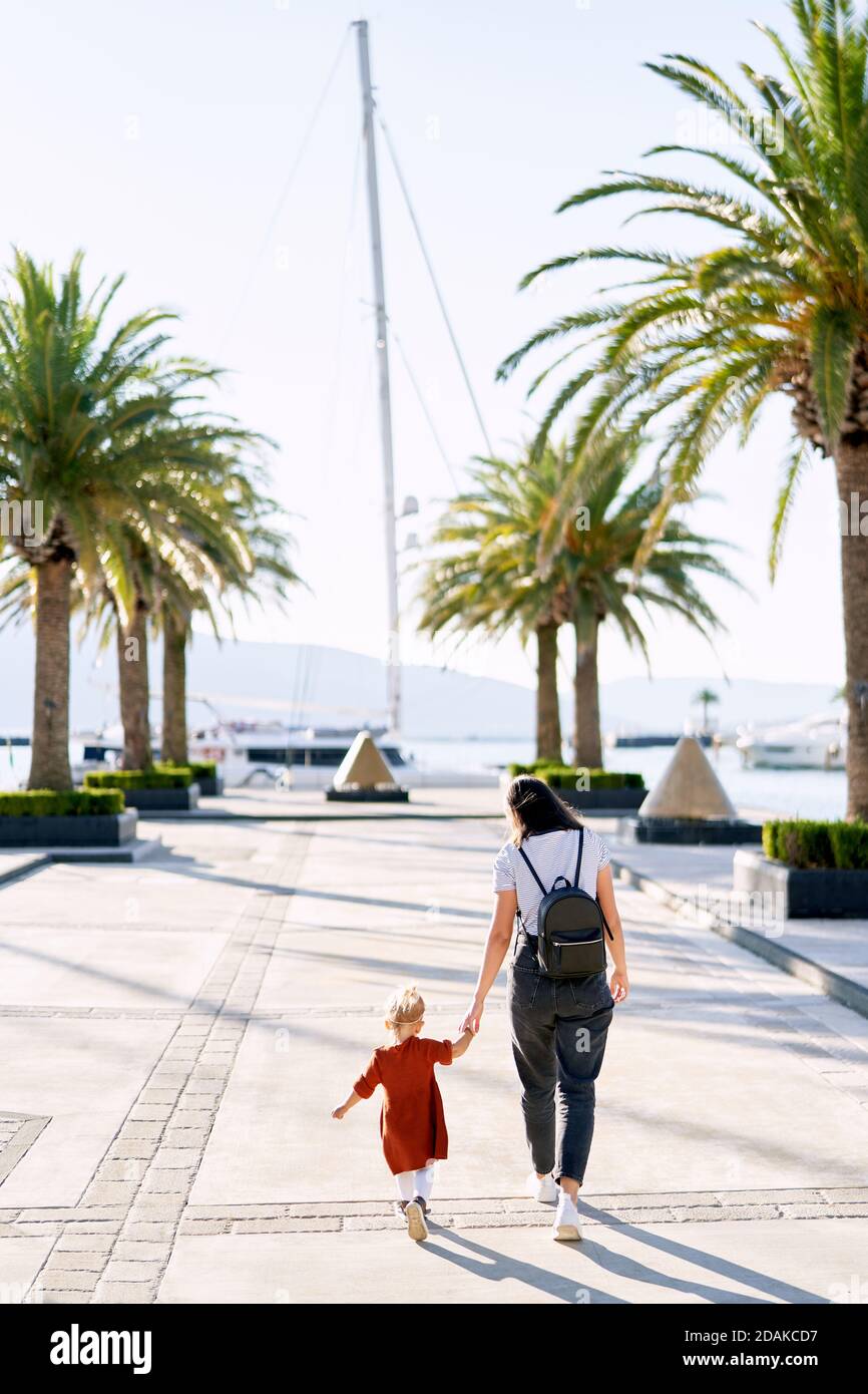 Students Walking In Line Hands Behind Back