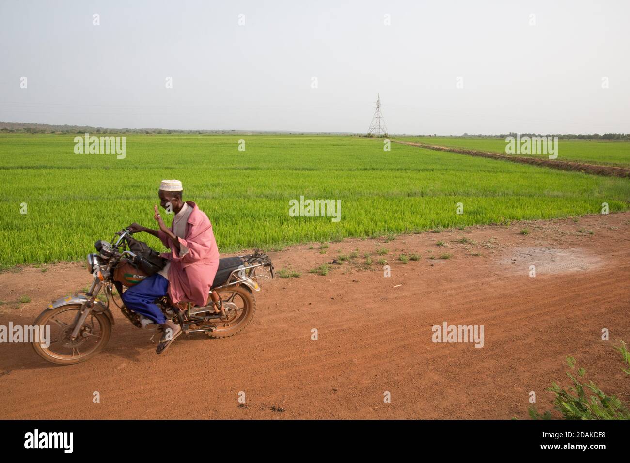 Selingue, Mali, 28th April 2015; A farmer arriving at his field. Stock Photo