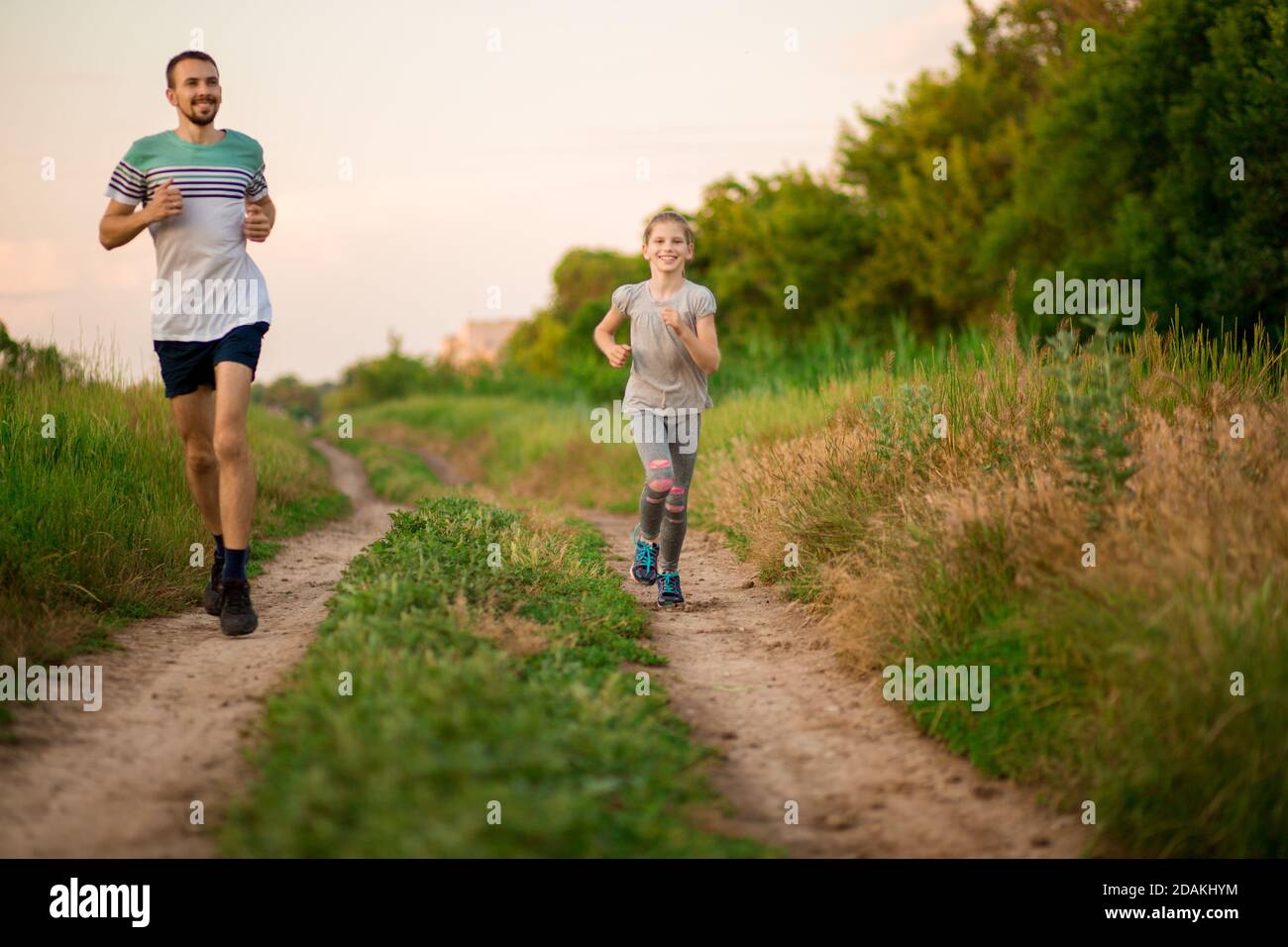 Run With Daughter Rfds Father and daughter jogging. Cheerful father and daughter run in park ...