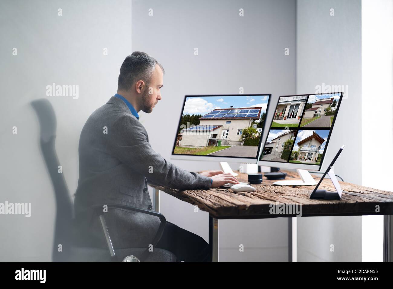 Real Estate Home Photos On Computer Screen Stock Photo Alamy