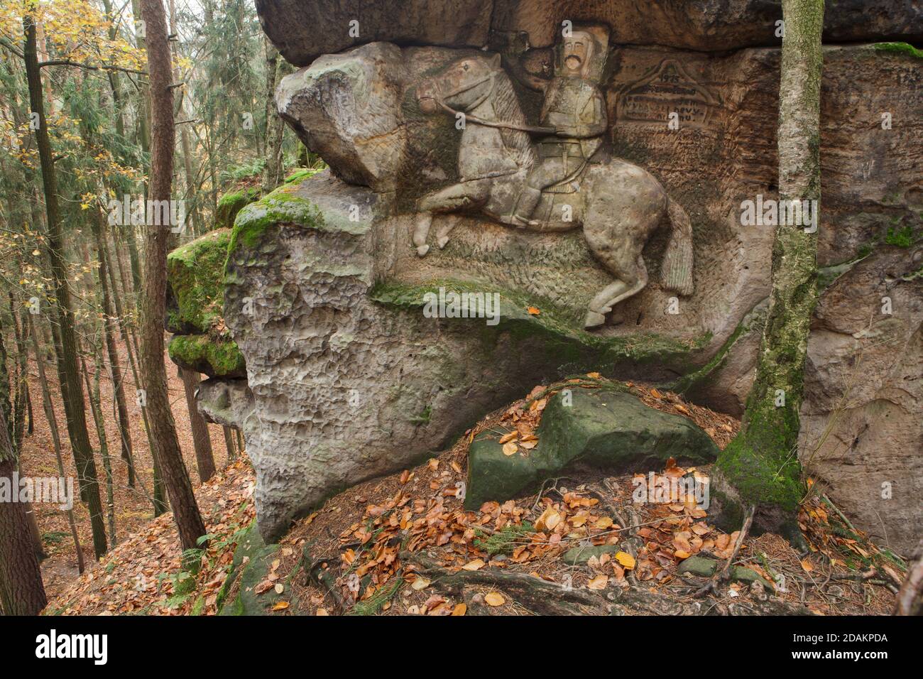 King George of Poděbrady depicted in the rock relief by Czech amateur sculptor Vojtěch Kopic carved in the natural rocks in 1975 in the area known now as Kopic's Rock Gallery (Kopicova skalní galerie) near the village of Kacanovy in the Bohemian Paradise (Český ráj) in North Bohemia, Czech Republic. Stock Photo