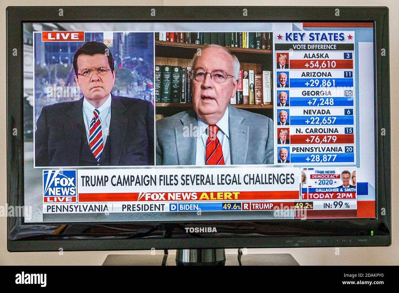 TV cable television screen monitor 2020 US presidential election results,Joe Biden Donald Trump votes electoral college popular vote count,campaign fi Stock Photo