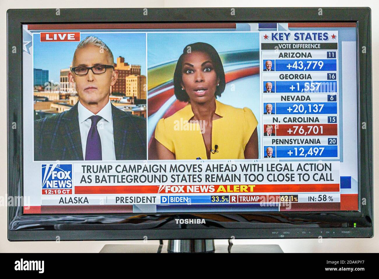 TV cable television screen monitor 2020 US presidential election results,Joe Biden Donald Trump votes electoral college popular vote count,Harris Faul Stock Photo