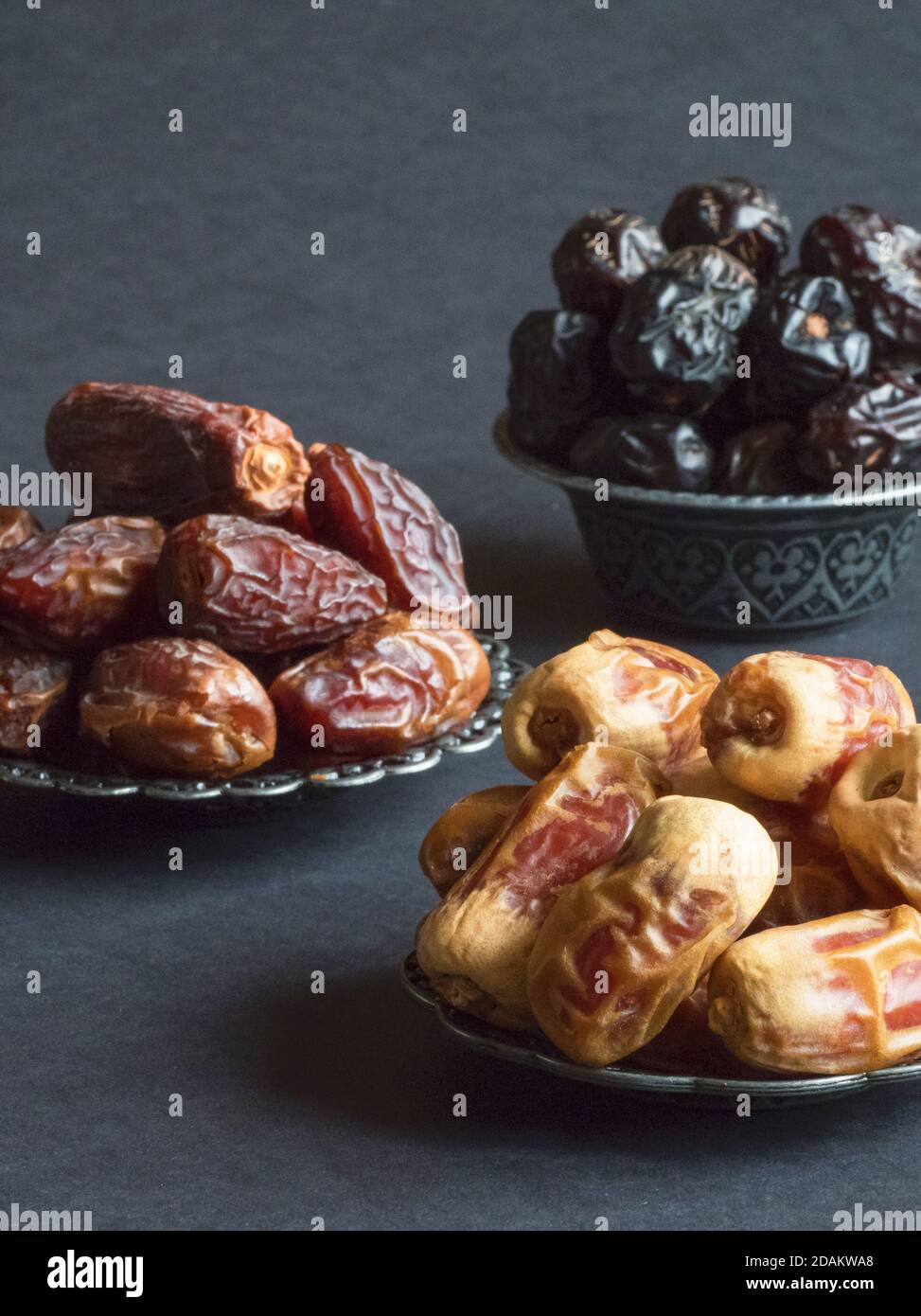 Arabic dates fruits are laid out on a dark table Stock Photo Alamy
