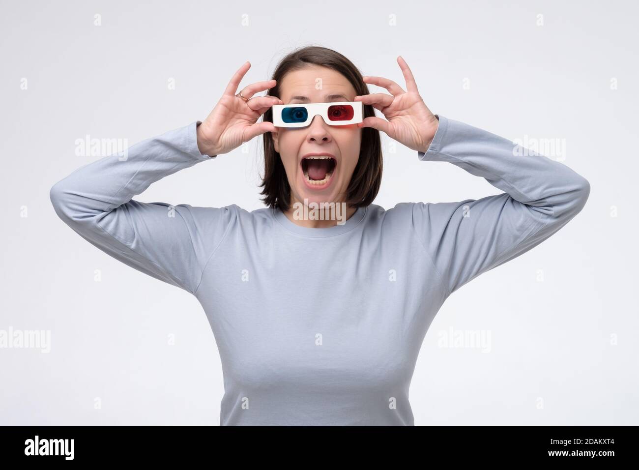 Mature caucasian woman with 3d glasses watching movie Stock Photo Alamy
