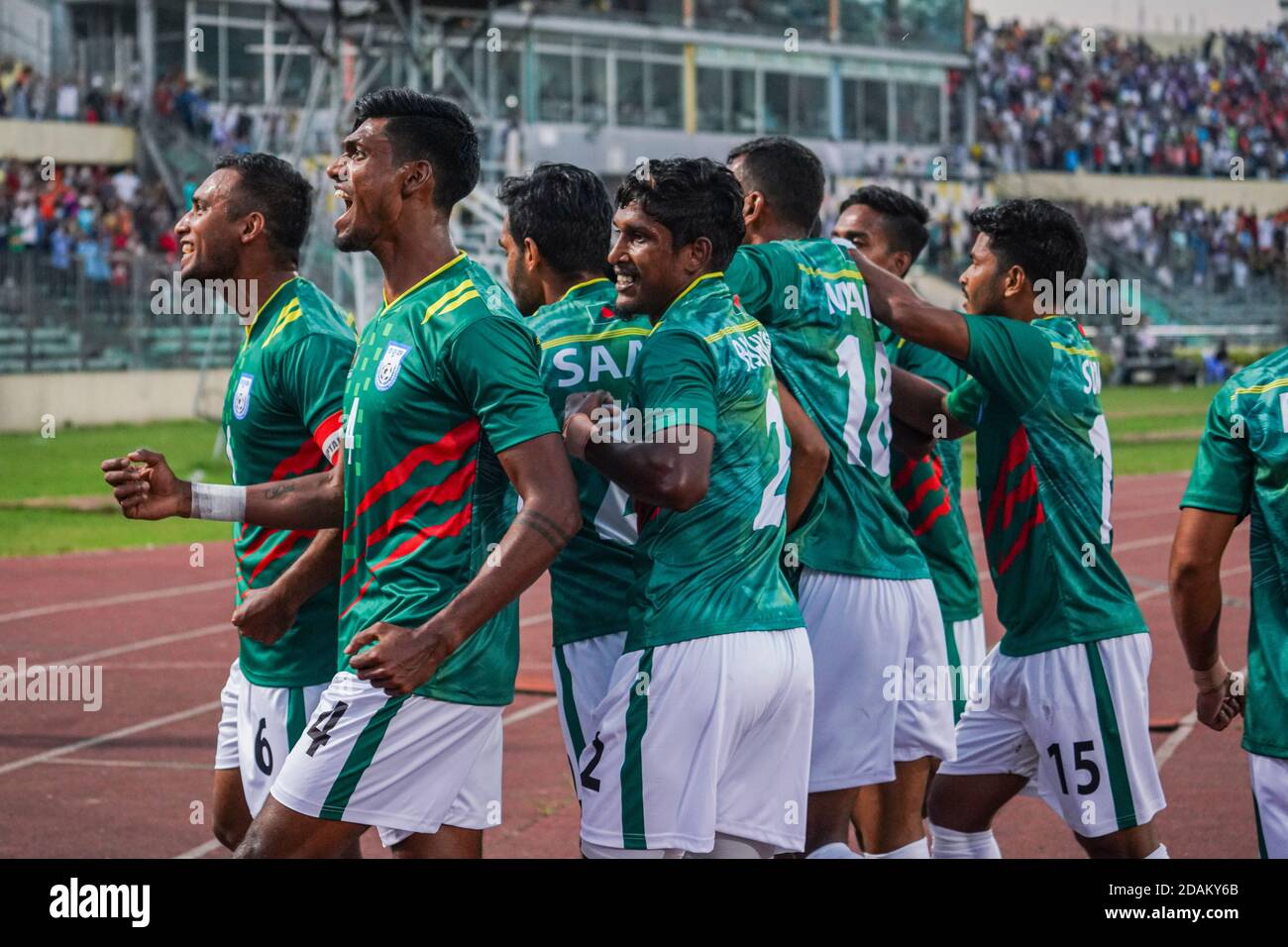 Bangladeshi players celebrate a goal during the First FIFA friendly