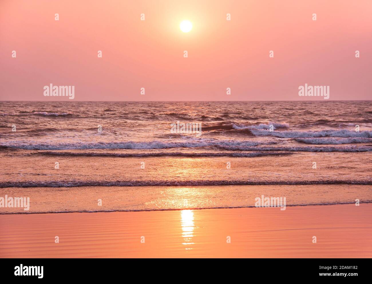 Colorful sunset on the beach. Goa, India Stock Photo - Alamy