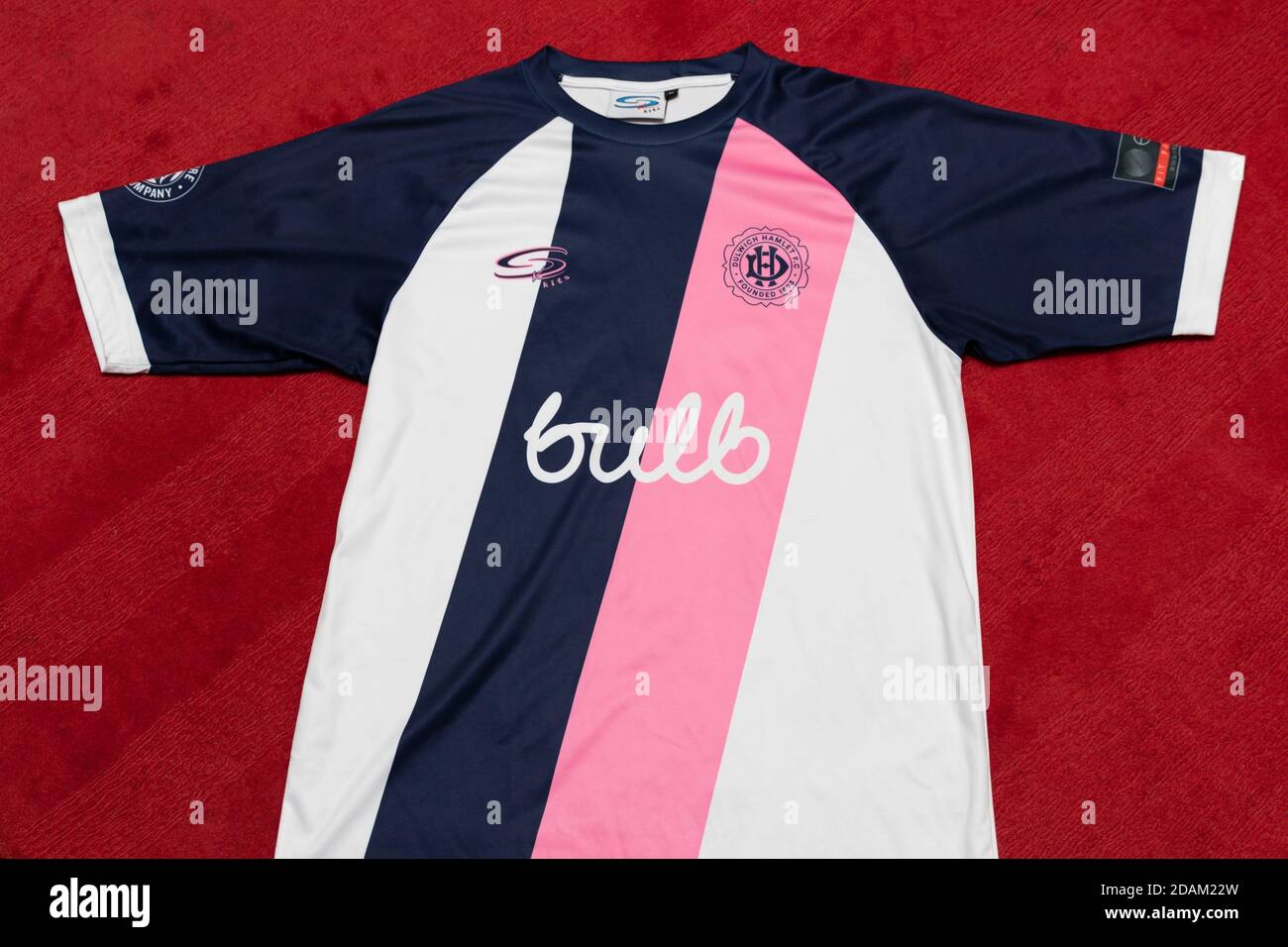 Front of the 2019/2020 Dulwich Hamlet white Women's Away / Men's third shirt  with Bulb main sponsor Stock Photo - Alamy