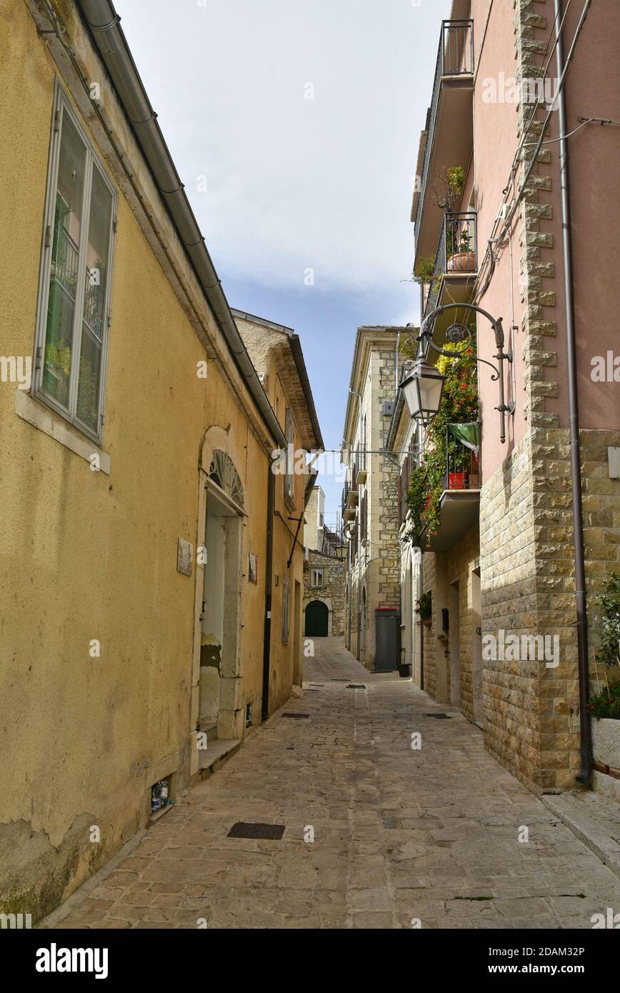 A narrow street among the old houses of Ferrazzano, a medieval village in the Molise region, Italy. Stock Photo